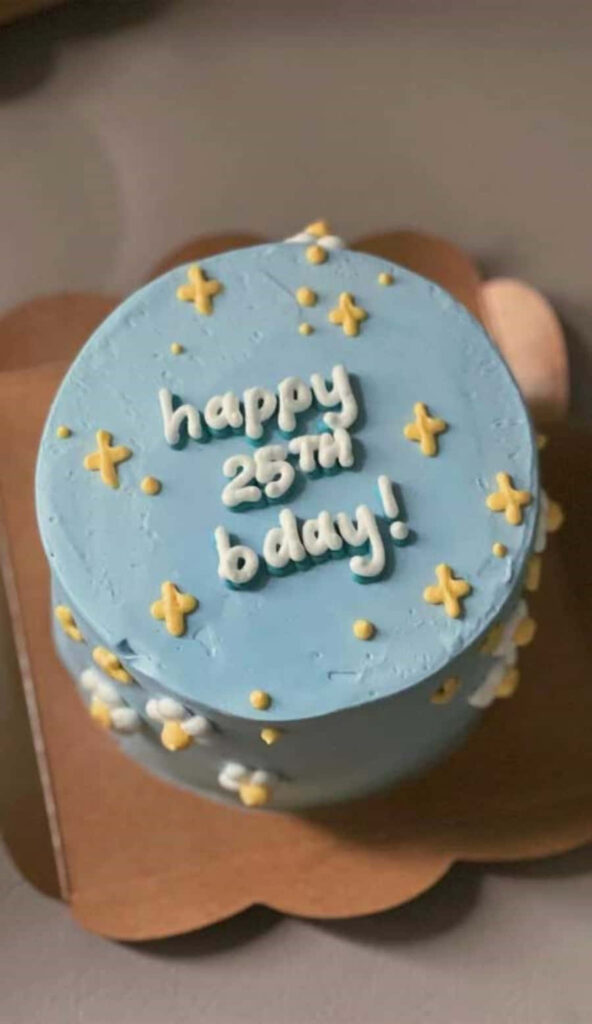 Cheerful 25th Birthday Cake Wallpaper with Blue Icing & Yellow Stars