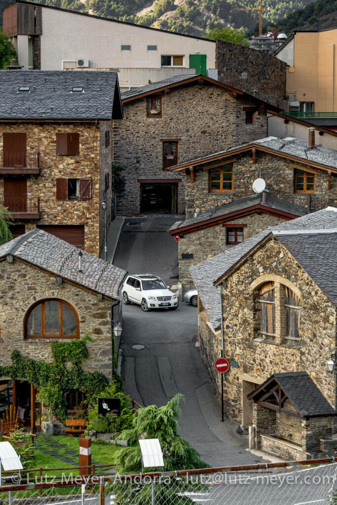 Charming Andorra Village Wallpaper: Serene Stone Houses & Mountains
