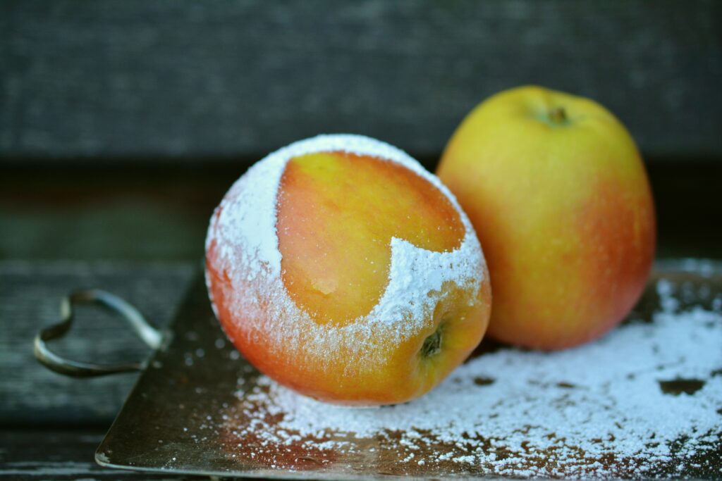 Charming Apple Wallpaper: Rustic Tray with Heart-Shaped Flour Spot