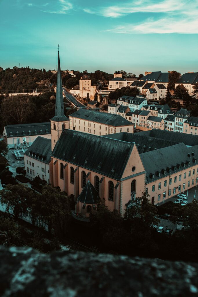 Charming Urban Landscape Wallpaper: Classic Architecture & Spire