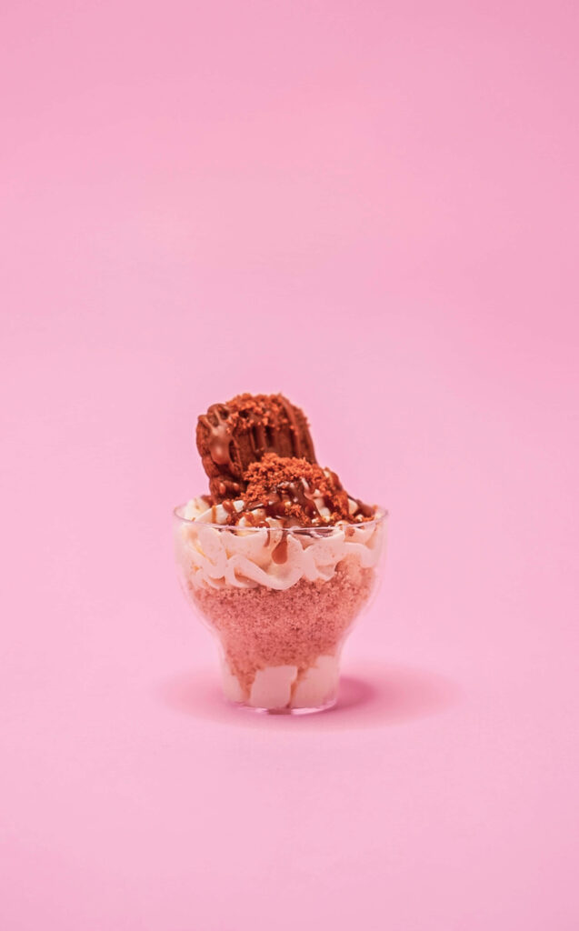 Charming Chocolate Ice Cream Wallpaper on Soft Pink Background