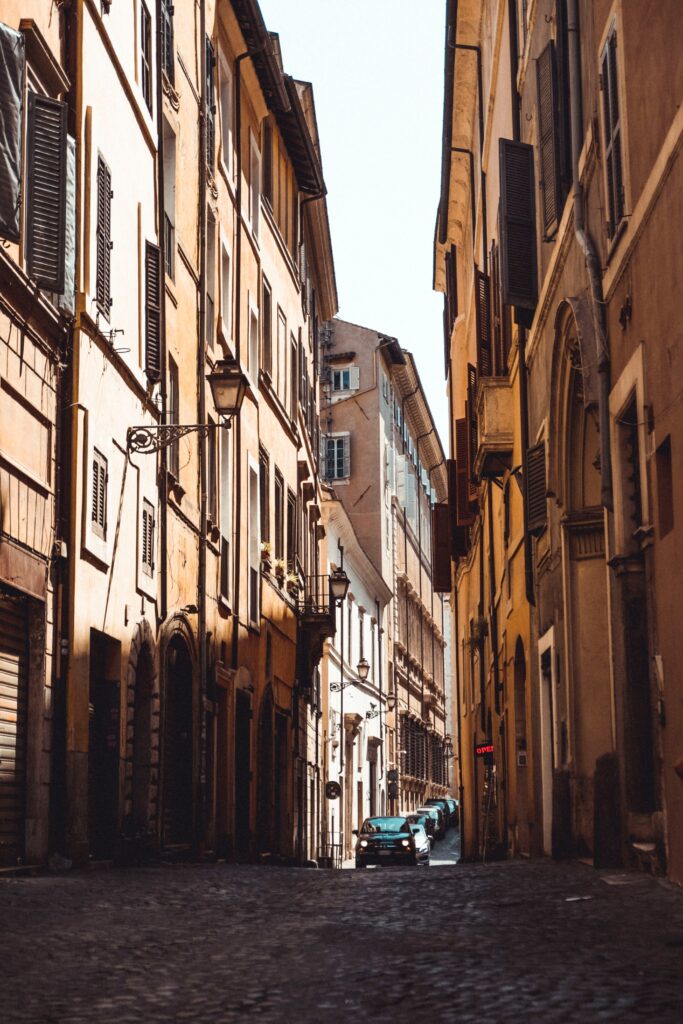 Charming City Street Wallpaper: Historic Warm-Toned Facades & Cobblestones
