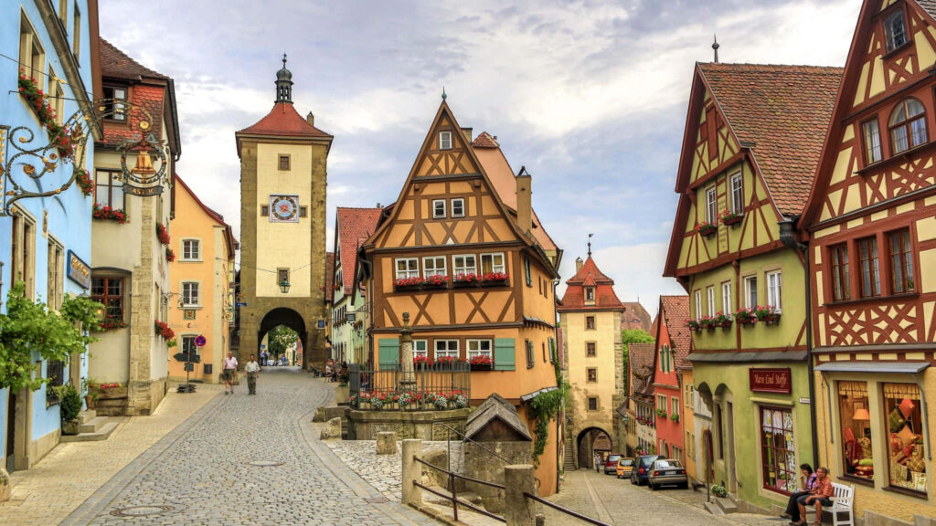 Charming Cobblestone Street in Germany: Colorful Architectural Heritage Wallpaper