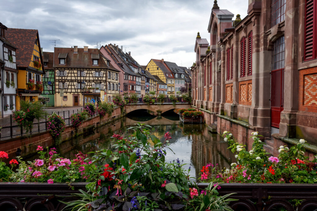 Charming Colmar, France: Vibrant Canal & Historic Architecture Wallpaper