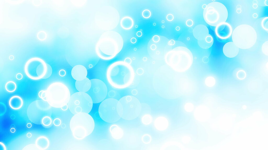 Dreamy white and blue bubbles floating on a serene light blue background calming wallpaper