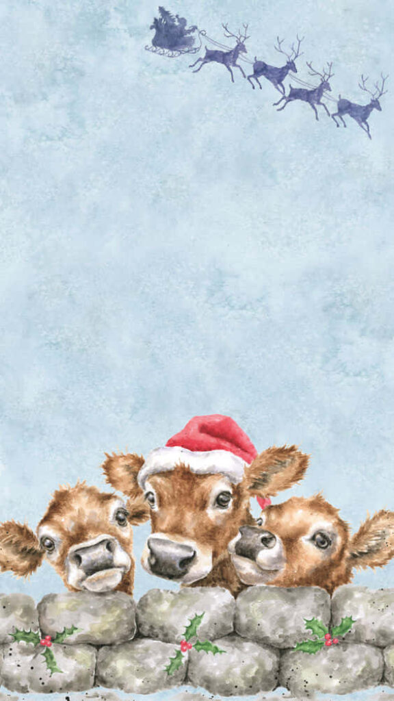 Festive Cow Wallpaper: Cows, Santa Hat, and Sleigh Silhouette