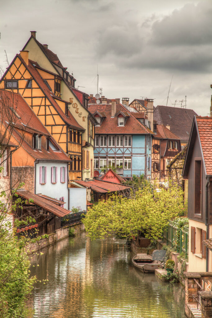 Charming European Cityscape Wallpaper with Serene River & Architecture