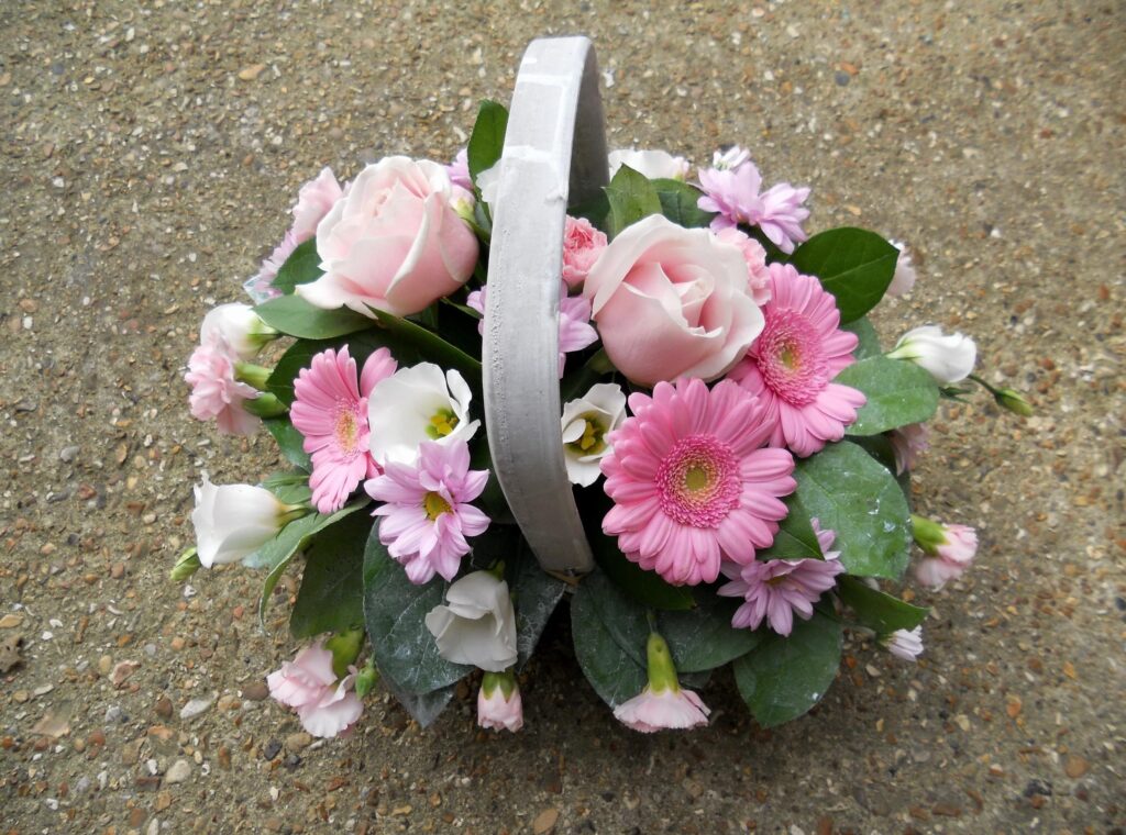 Charming Floral Wallpaper: Pink Roses & Gerberas in a Basket