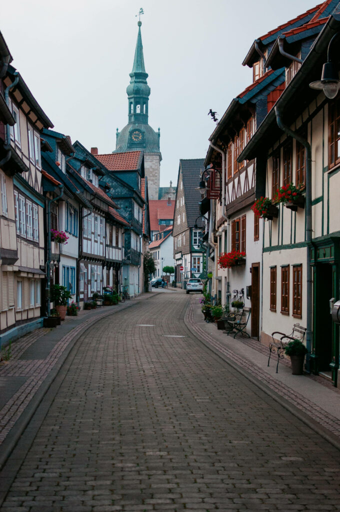 Charming German Cobblestone Street with Half-Timbered Houses Wallpaper