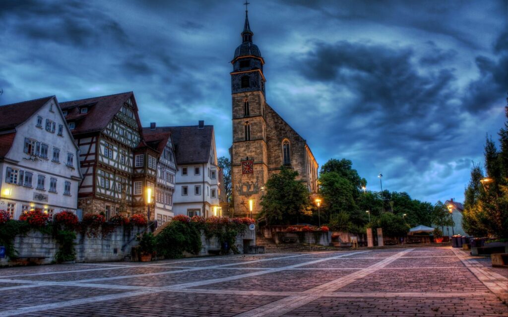 Charming German Town Square HDR Wallpaper - Historic Church & Flowers