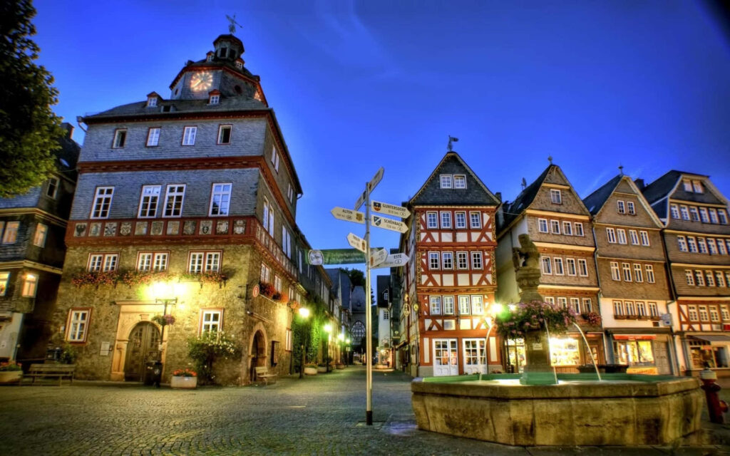 Charming German Town Square Wallpaper at Dusk - Historic Beauty