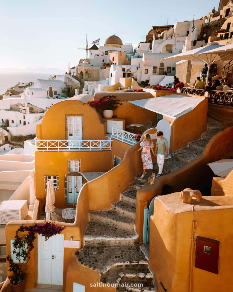 Charming Greek Village at Twilight - Whitewashed Buildings & Aegean Sea Wallpaper