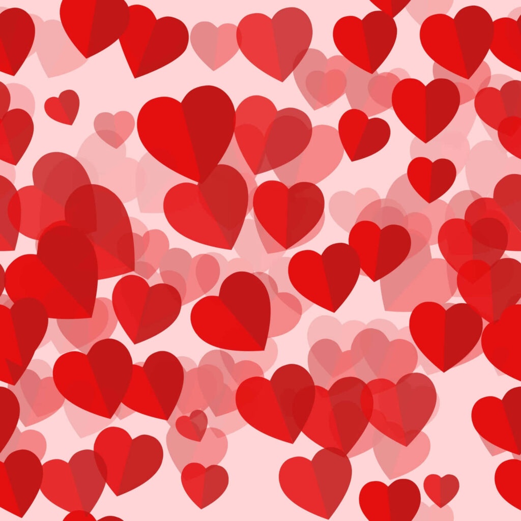 Charming Red Heart Pattern Wallpaper on Soft Pink Background