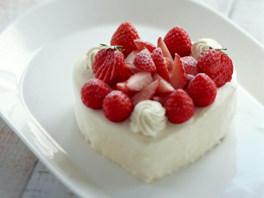 Charming Heart-Shaped Strawberry Cake Wallpaper with Cream & Berries
