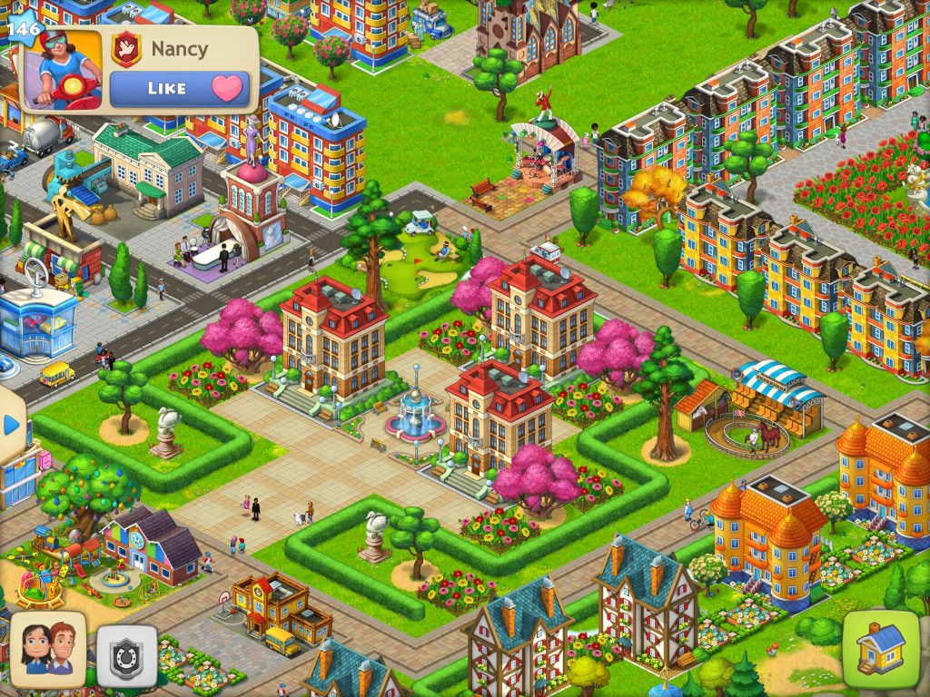 Isometric town-building game wallpaper with colorful houses green parks pink trees and central fountain