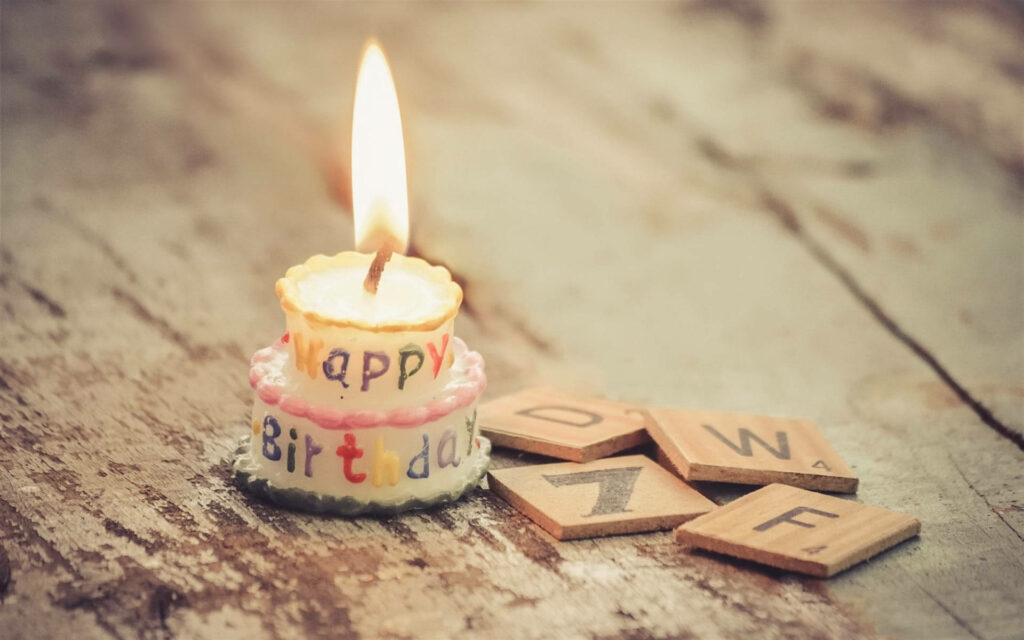 Charming Mini Birthday Cake Wallpaper: Cozy Celebration Scene