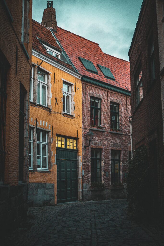 Charming Old City Lane Wallpaper: Historic European Architecture Background
