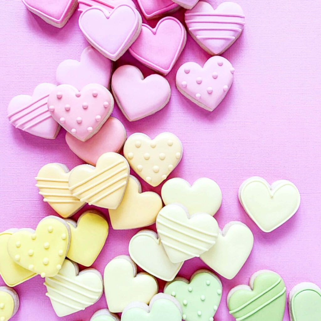 Charming Pastel Heart-Shaped Cookies Wallpaper for Valentine's Day