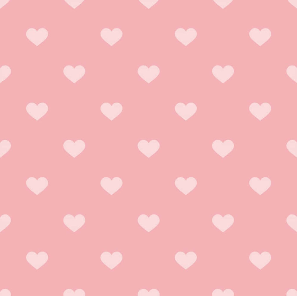 Charming Pastel Pink Wallpaper with White Heart Pattern Design
