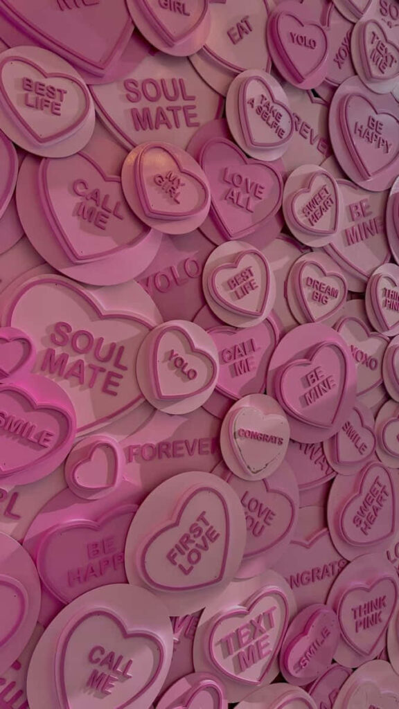 Charming Pink Heart Button Wallpaper: Romantic & Playful Design