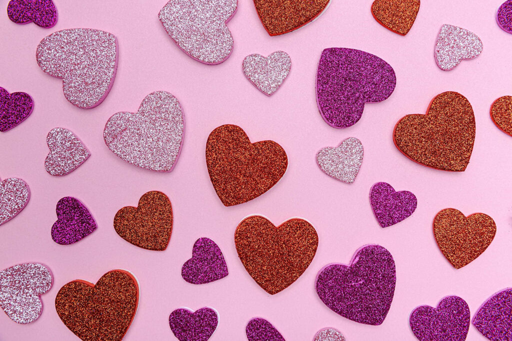 Vibrant Pink Glitter Heart Wallpaper Background - Festive Design