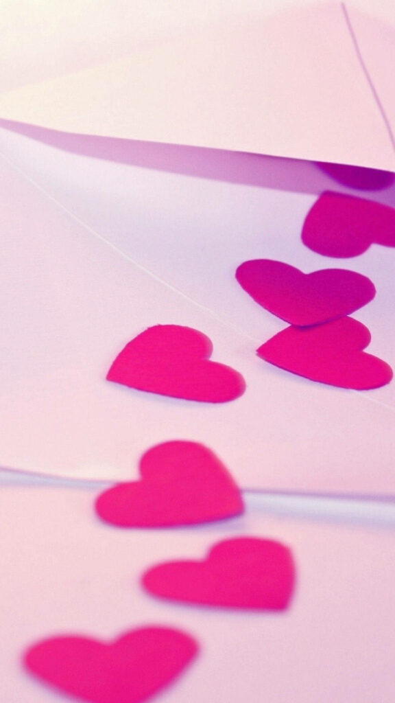Charming Pink Heart Cutout Wallpaper for a Romantic Phone Background