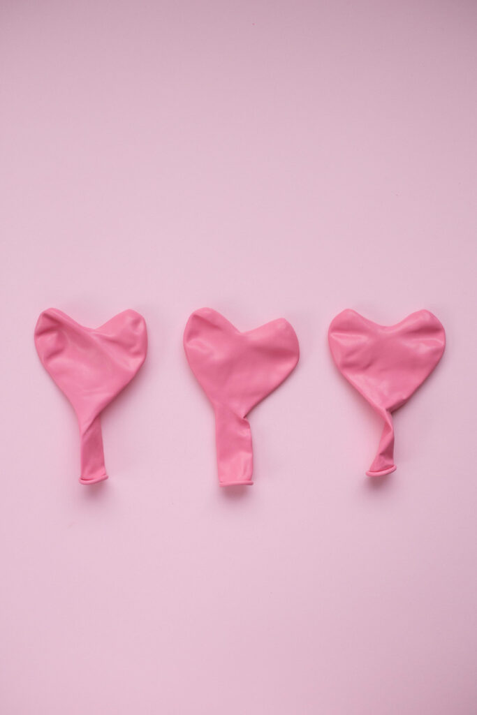 Charming Pink Heart Balloons Wallpaper: Soft Romantic Background