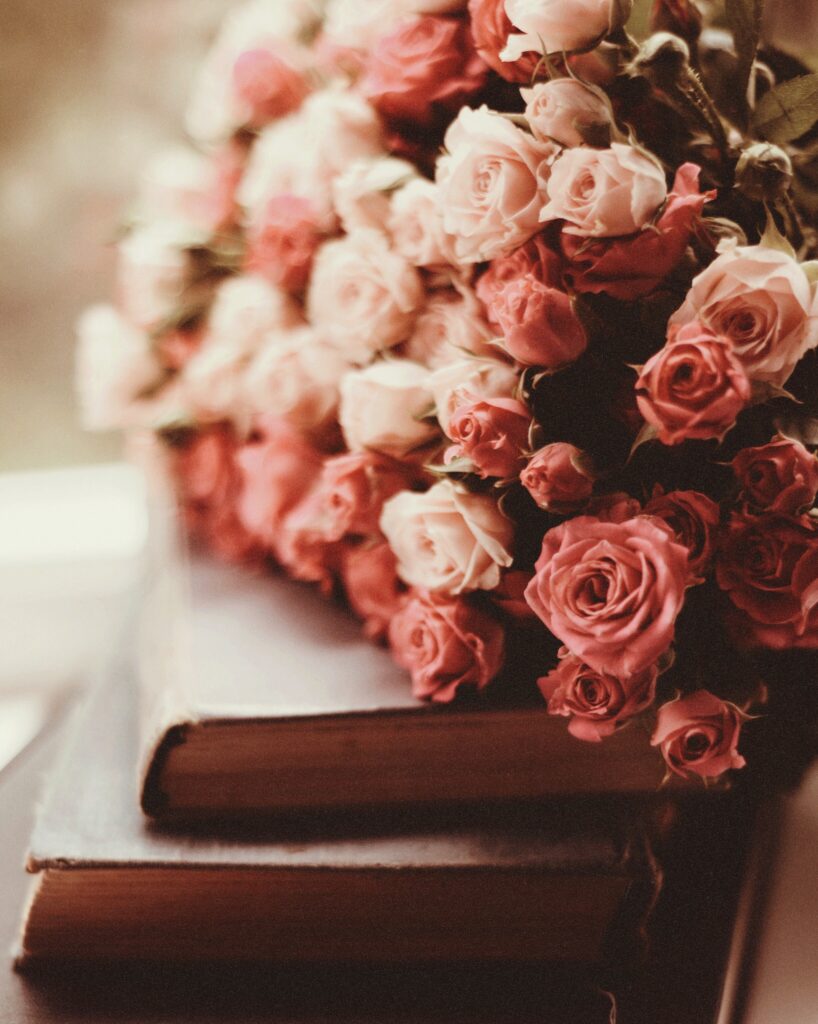 Charming Pink Rose Wallpaper on Vintage Books – Romantic Background