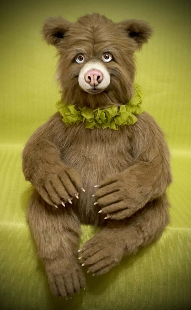 Whimsical Plush Bear Wallpaper with Bright Green Scarf - Fun Background