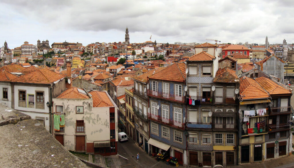Charming Porto Wallpaper: Iconic Rooftops & Rustic Streets Background