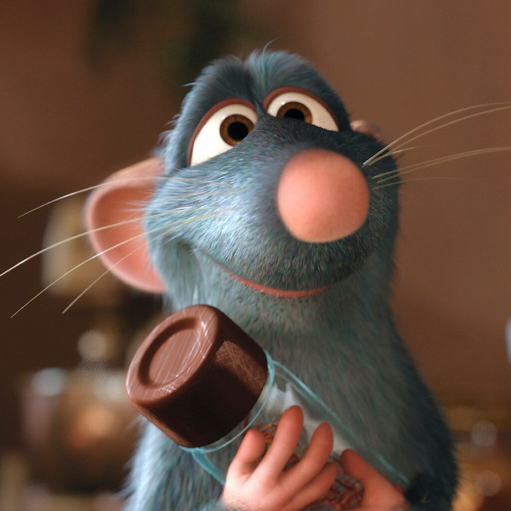 Charming Ratatouille Wallpaper: Remy’s Joyful Cooking Moment