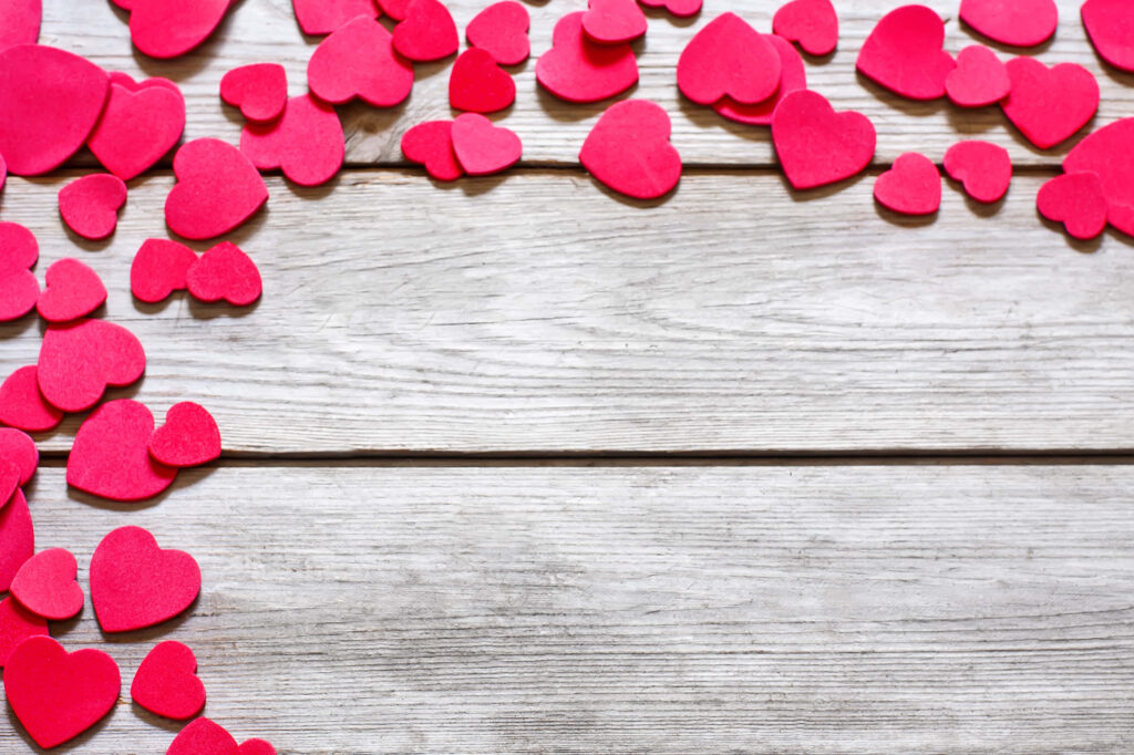 Charming Red Heart Wallpaper on Rustic Wood - Romantic Background