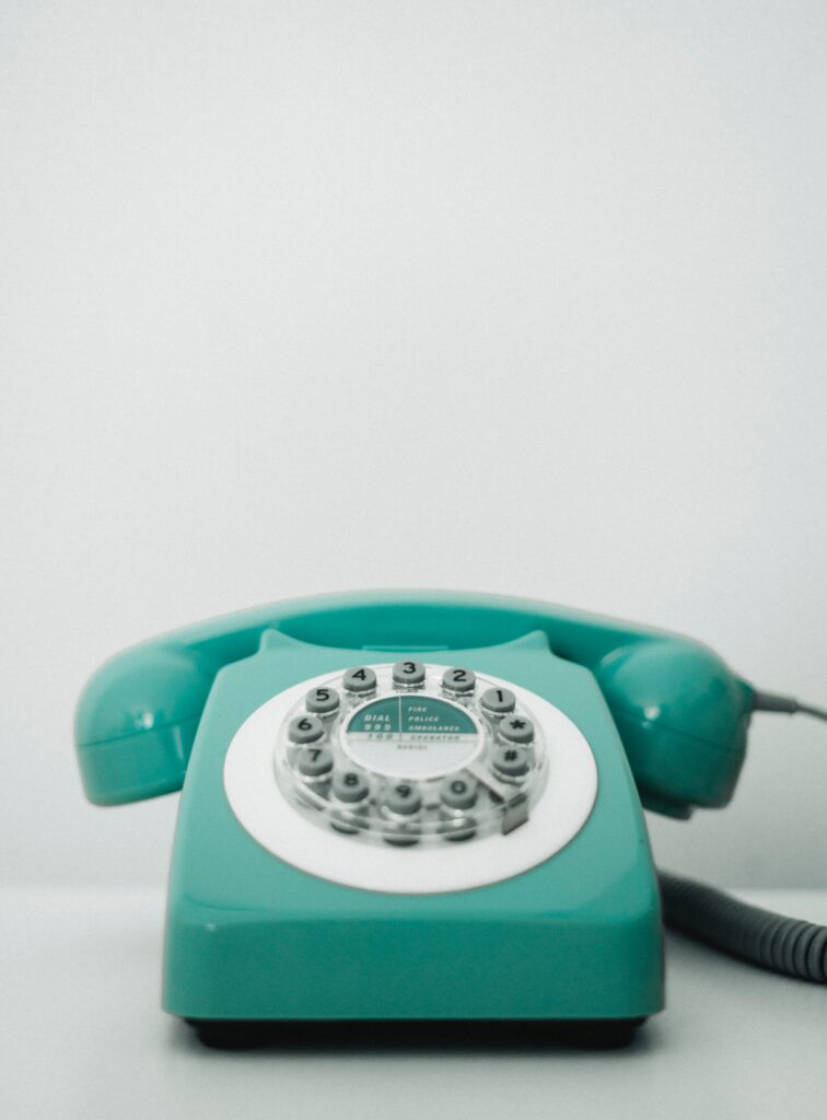 Vintage Turquoise Rotary Phone Wallpaper - Nostalgic Minimalist Design