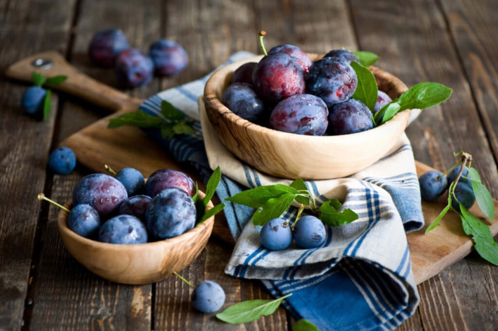 Rustic Wallpaper: Italian Plums & Blackberries in Cozy Wooden Bowls