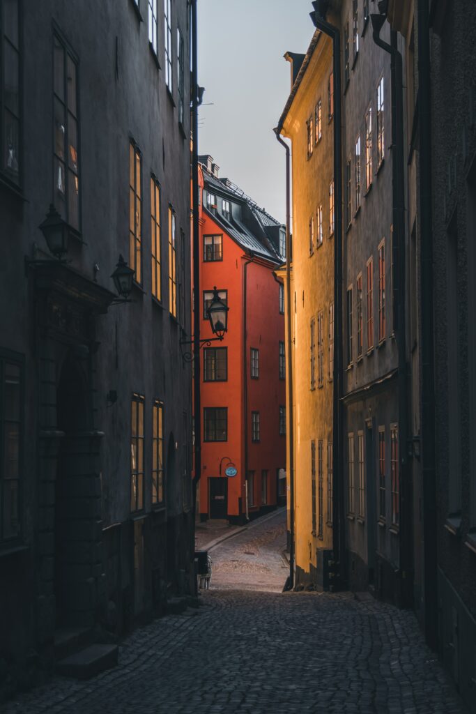 Charming Stockholm Street Scene Wallpaper: Vintage Urban Serenity