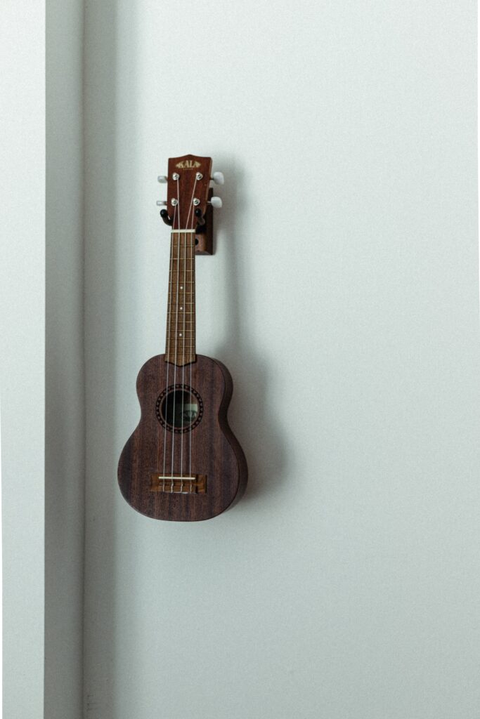 Charming Ukulele Wallpaper: Minimalist Design & Wooden Texture