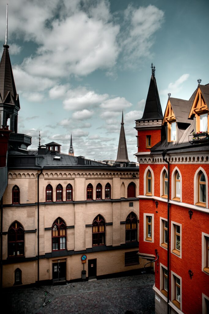 Charming Urban Wallpaper with Historic Architecture and Vibrant Tones