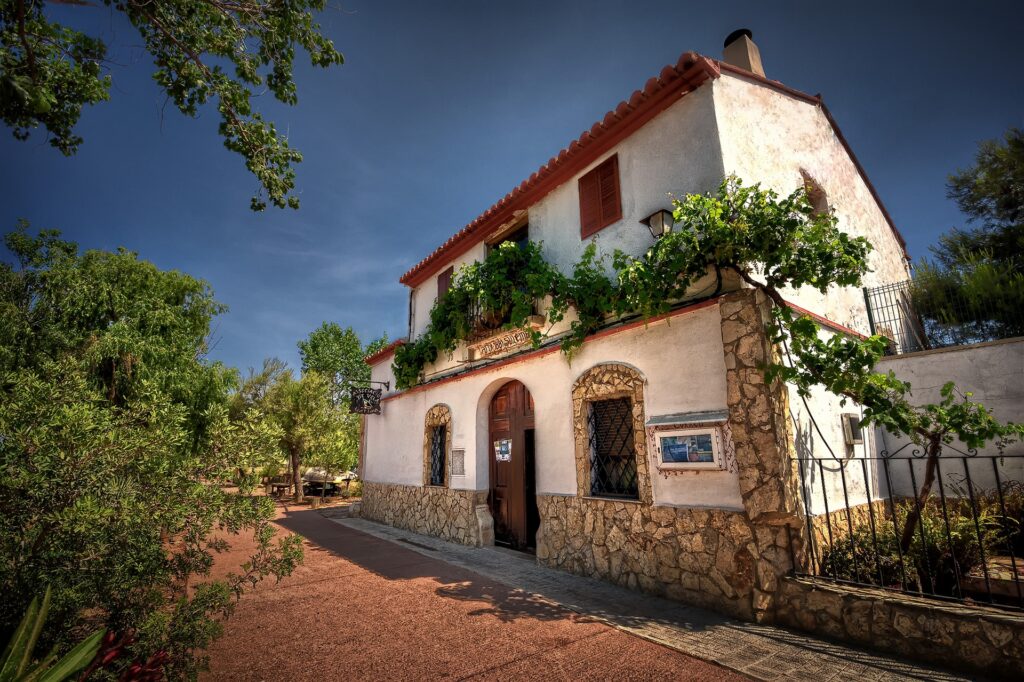 Charming Valencia Building Wallpaper: Rustic Architecture & Greenery