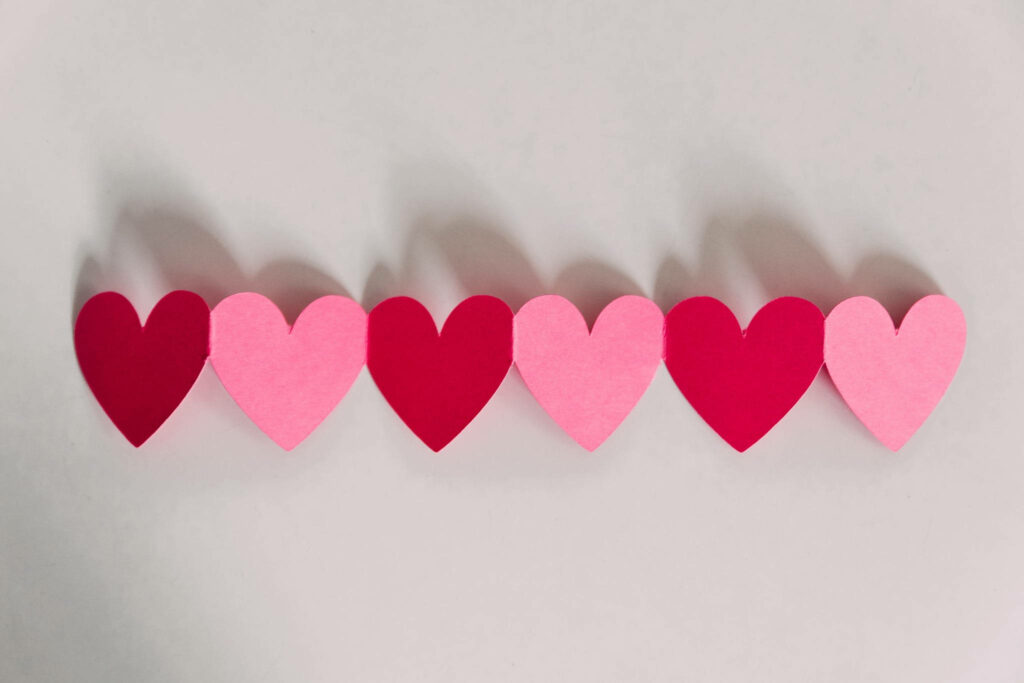 Charming Valentine’s Day Wallpaper: Pink & Red Heart Background