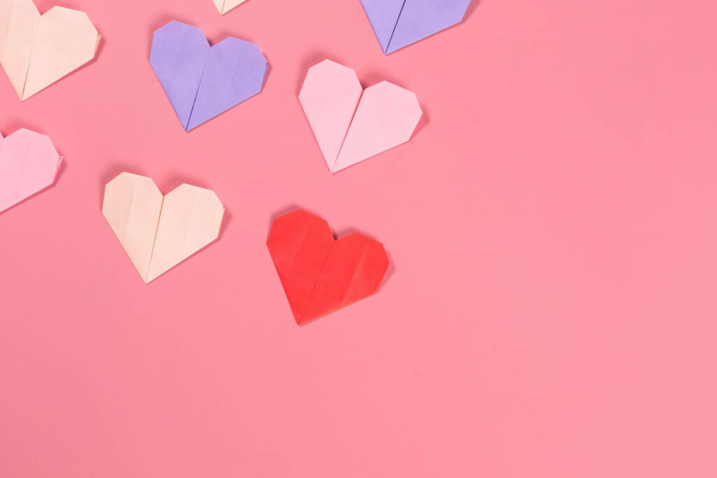 Charming Valentine's Day Origami Hearts Wallpaper in Soft Pink