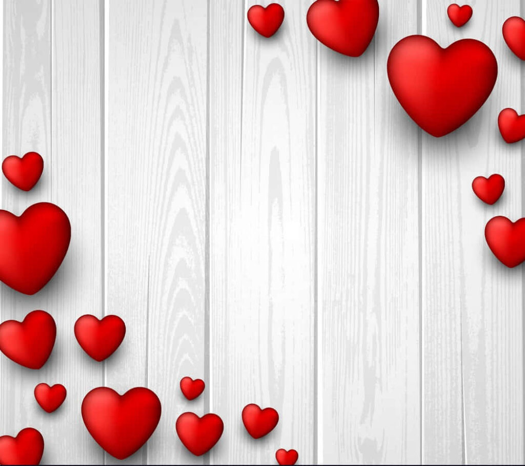 Charming Valentine's Day Wallpaper: Red Hearts on Rustic White Wood