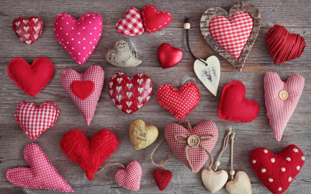 Charming Valentine's Day Wallpaper with Heart Pillows on Wood