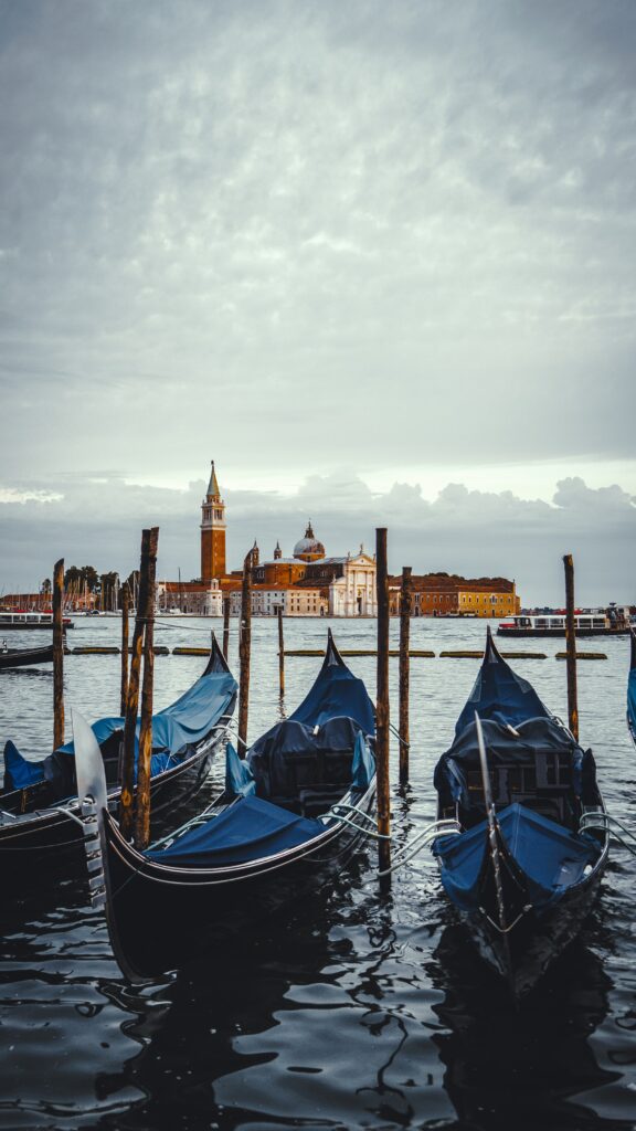 Venice Wallpaper: Gondolas on Serene Waters & Historic Cityscape