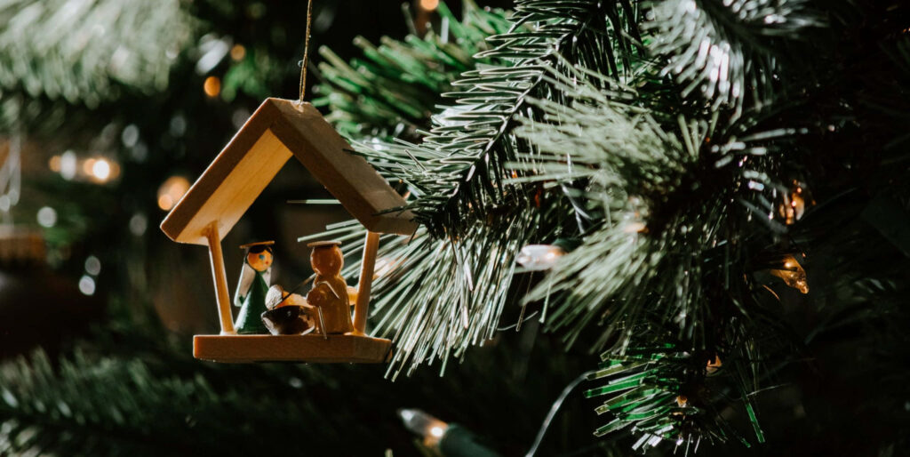 Rustic Wooden Nativity Ornament for Festive Christmas Decor Wallpaper