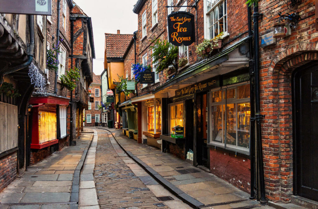 Charming The Shambles, York: Historic Cobblestones & Warm Storefronts Wallpaper