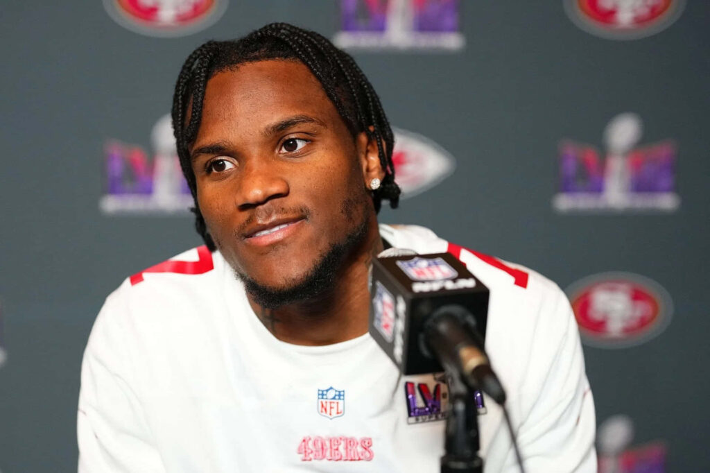 Charvarius Ward in San Francisco 49ers jersey at NFL press conference with sharp clear details Wallpaper