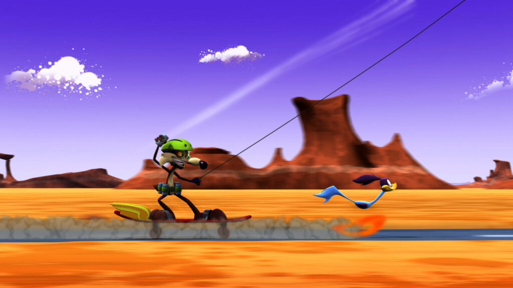 Chasing Frenzy: Wile E Coyote's Unending Pursuit of the Road Runner in the Desert Wallpaper