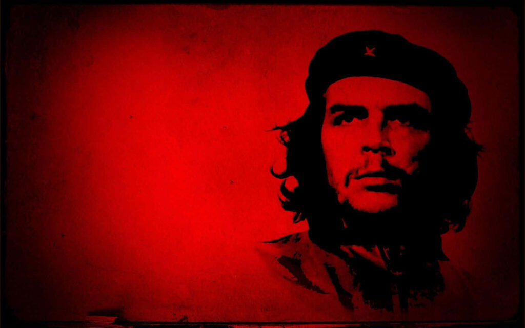 Che Guevara portrait wallpaper with bold red background symbolizing revolutionary spirit