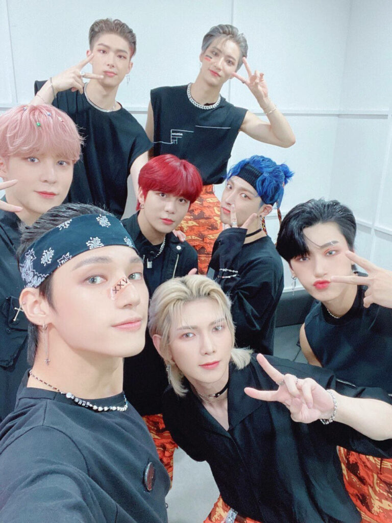 Vibrant Ateez Wallpaper: Cheerful Members with Peace Signs