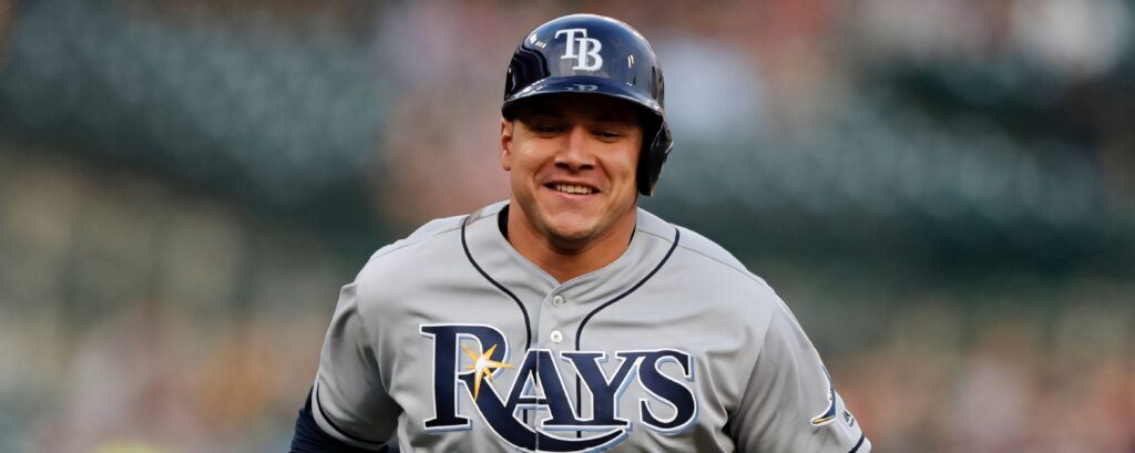 Cheerful Avisail Garcia in Tampa Bay Rays uniform running smiling energetic baseball wallpaper